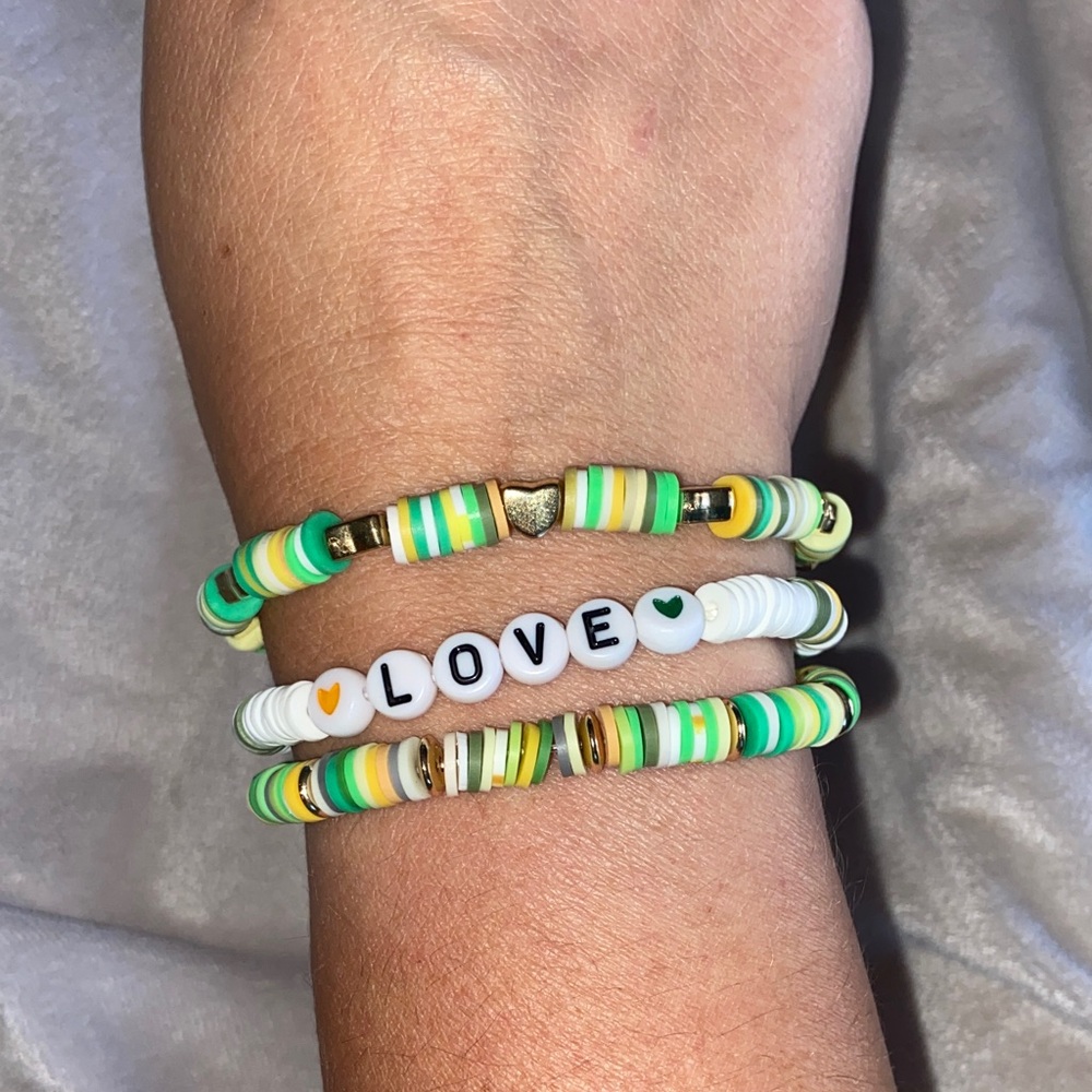Green and gold set of 3 clay beads and charms packer themed